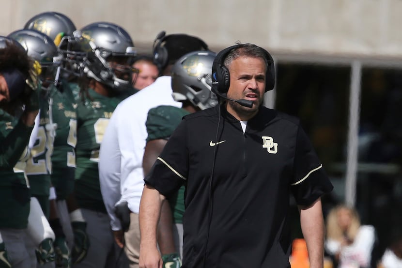 Baylor head coach Matt Rhule walks the sideline during their matchup with Texas in the...