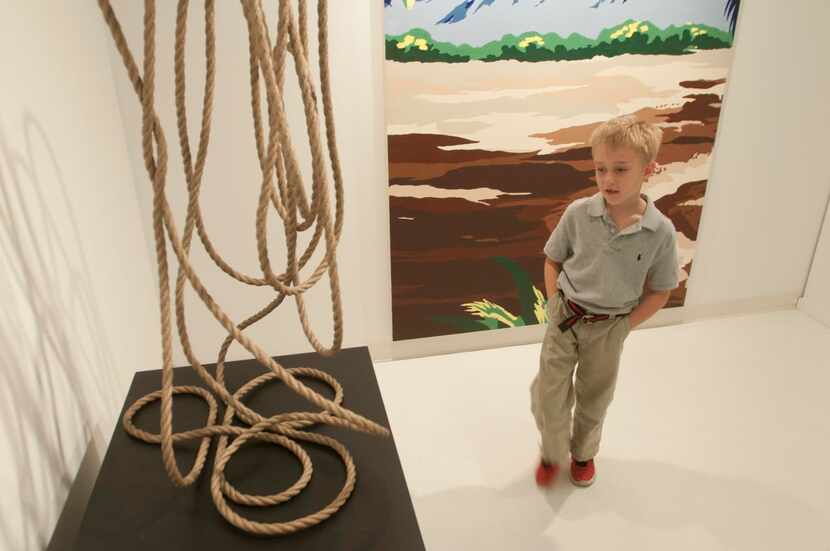 
Barrett Gibbins, 7, chose an untitled bronze sculpture from the Dallas Art Fair as one of...