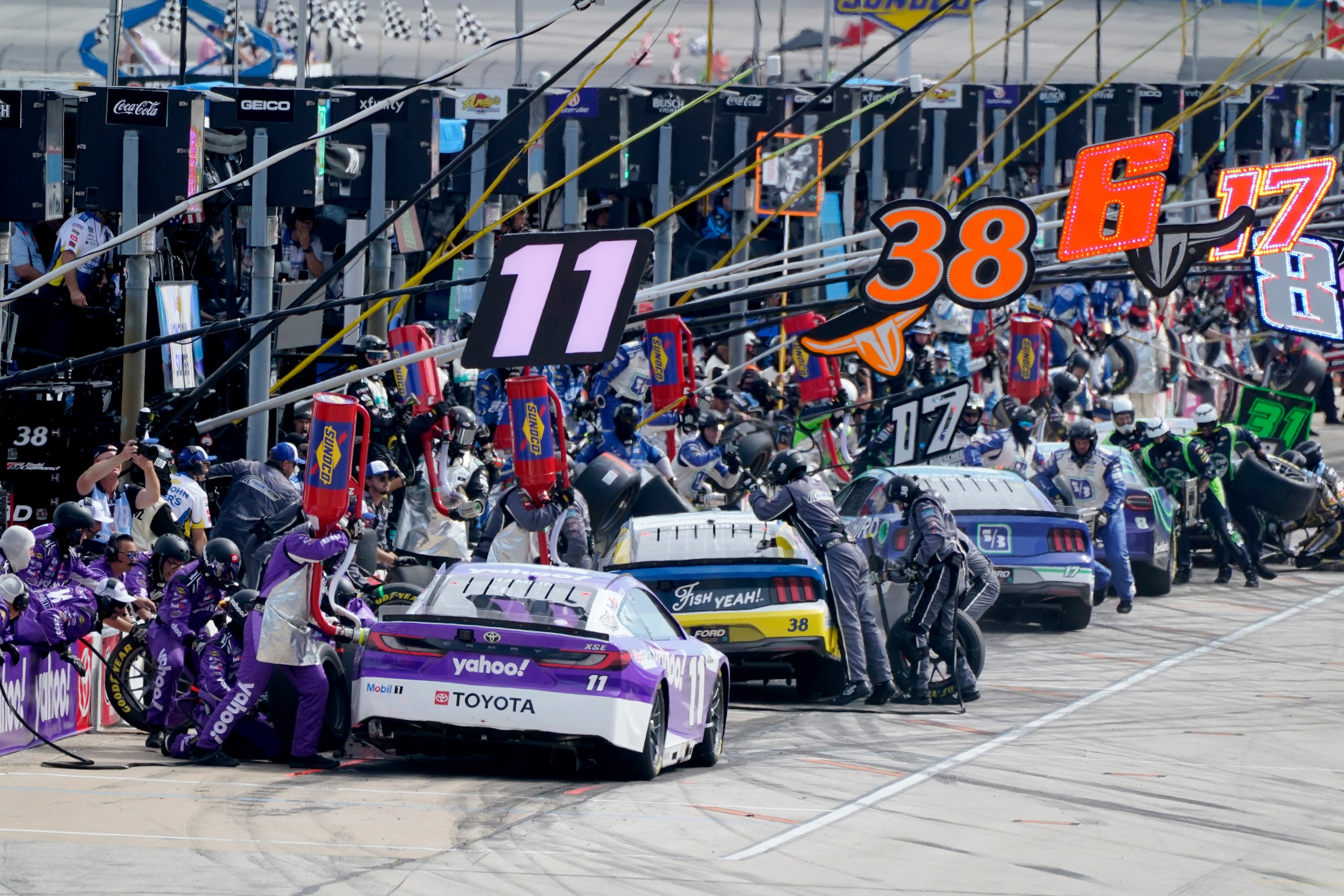 Drivers pit during the NASCAR Cup Series auto race at Texas Motor Speedway in Fort Worth,...