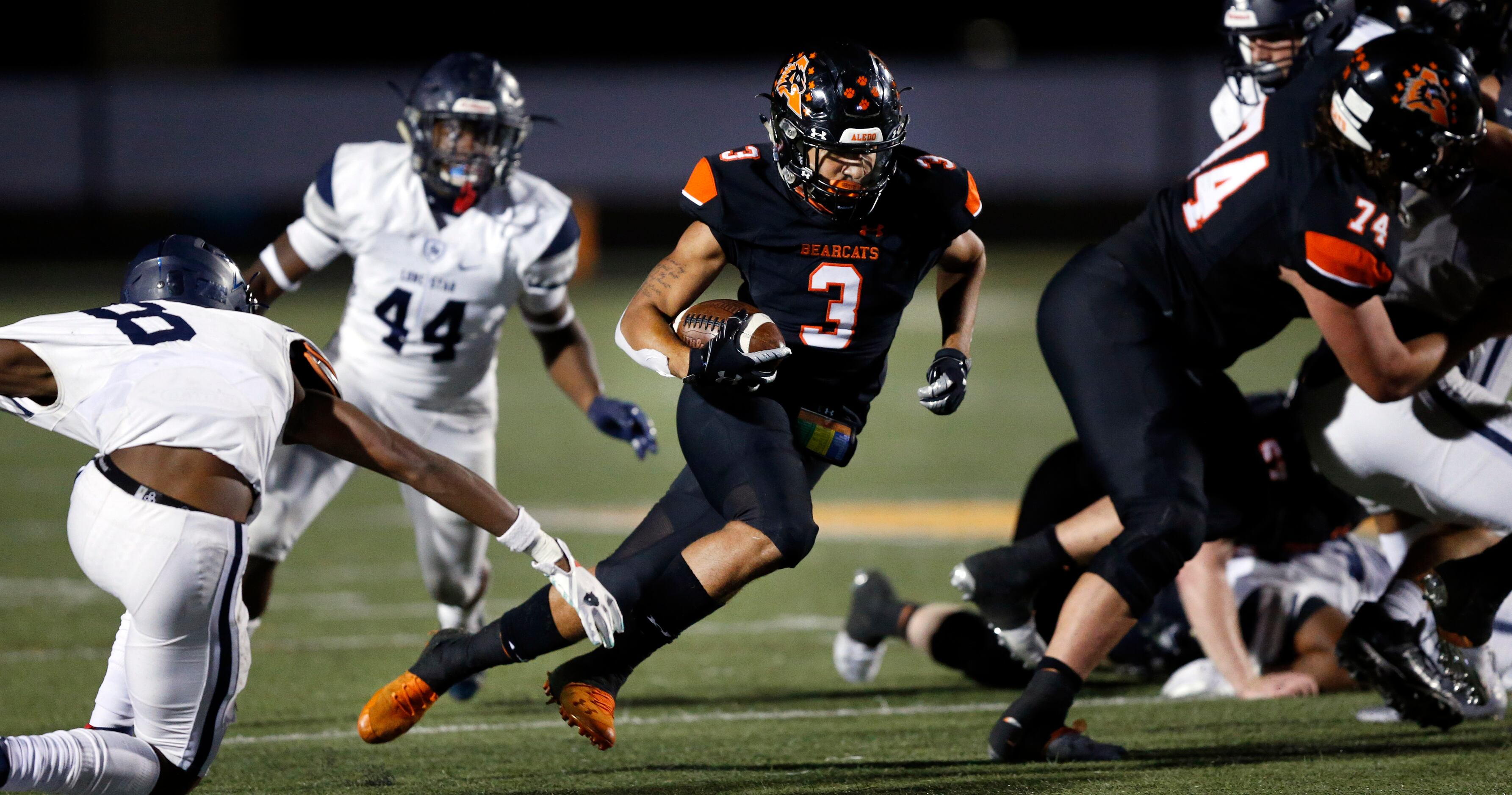 Aledo running back Jeremiah James (3) cuts to the inside away from Frisco Lone Star...