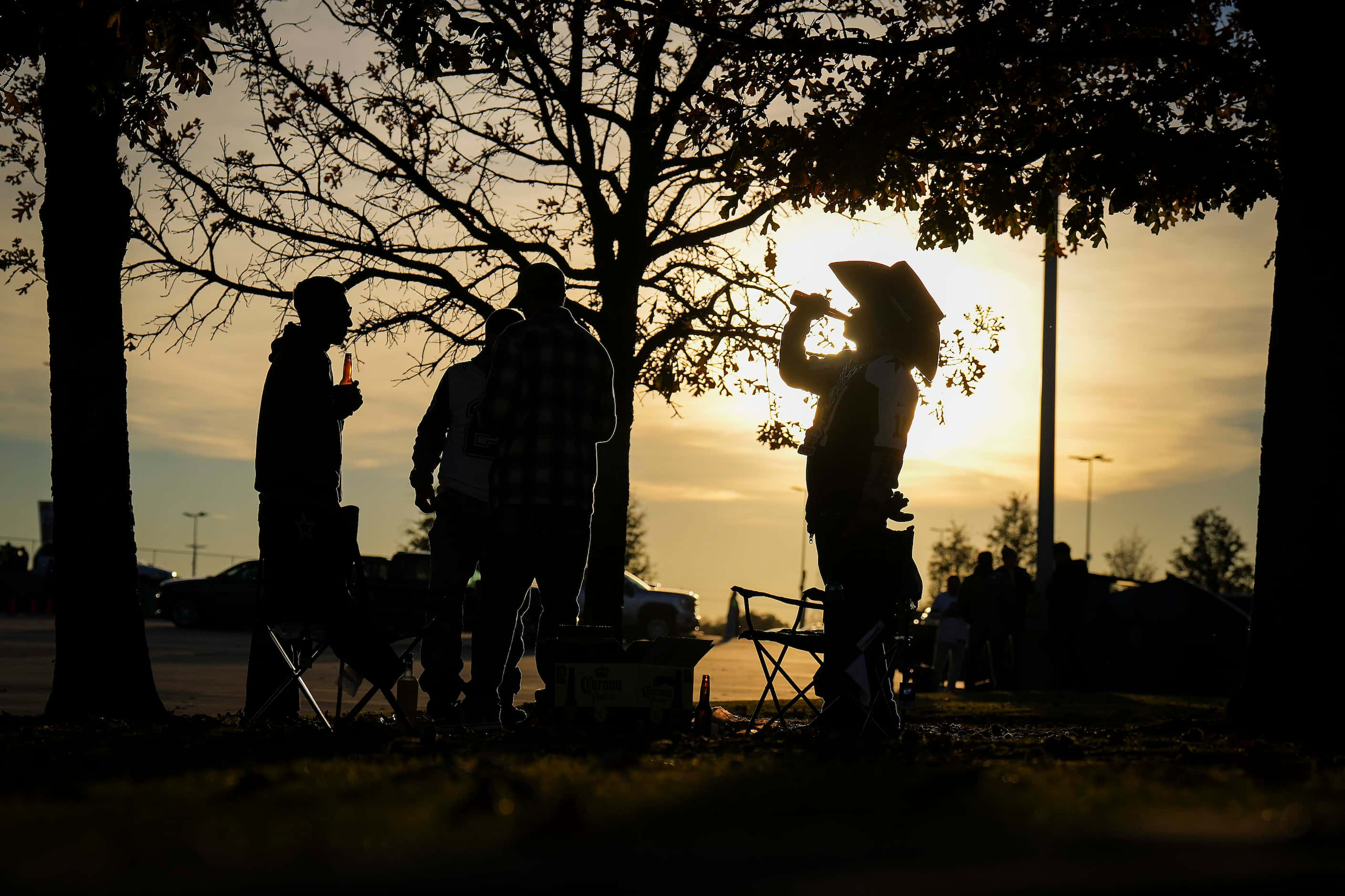 Fans tailgate before an NFL football game between the Dallas Cowboys and the Philadelphia...