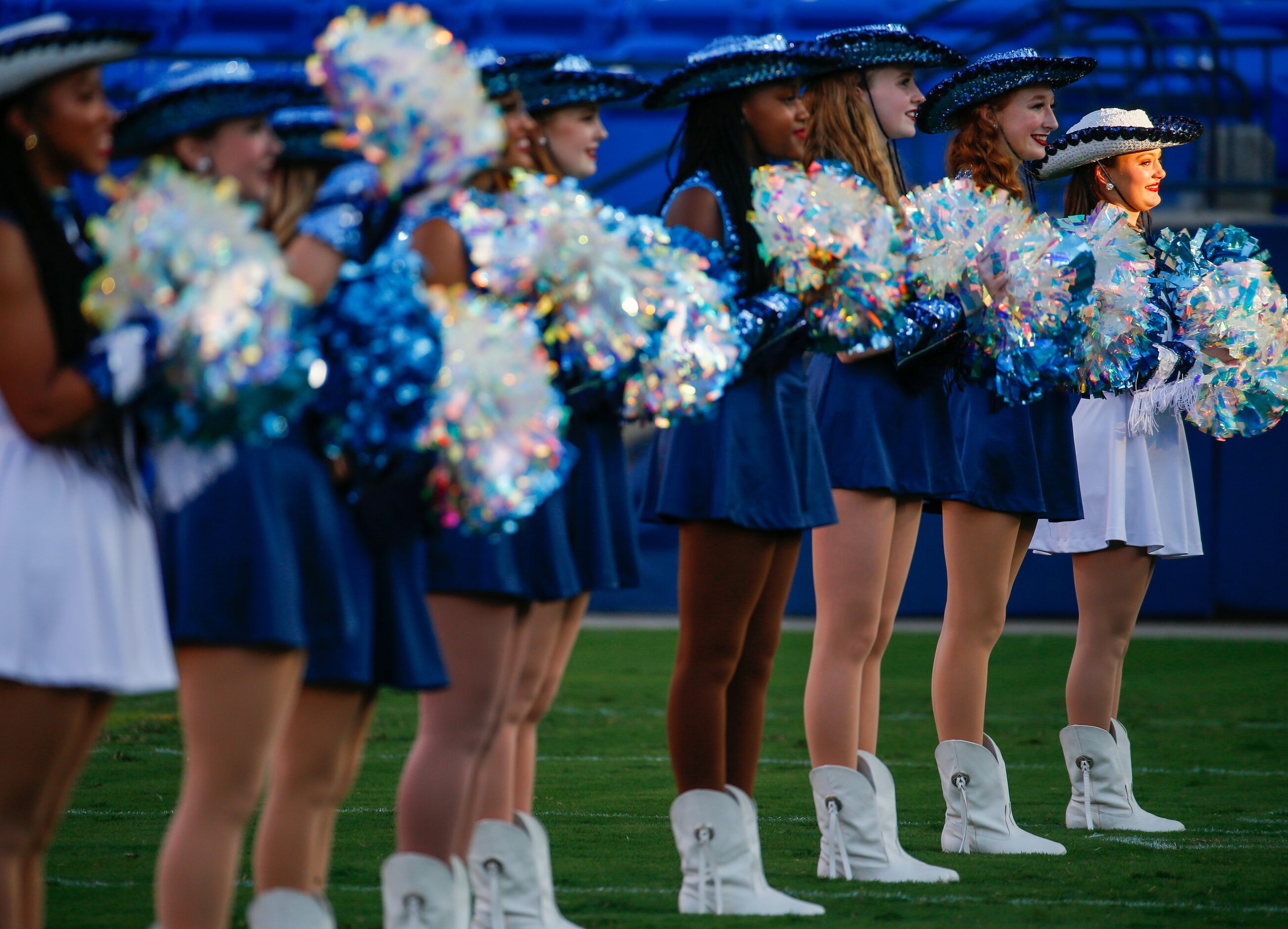 Emerson High School Majestics mark their spots before teams enter the field for game between...