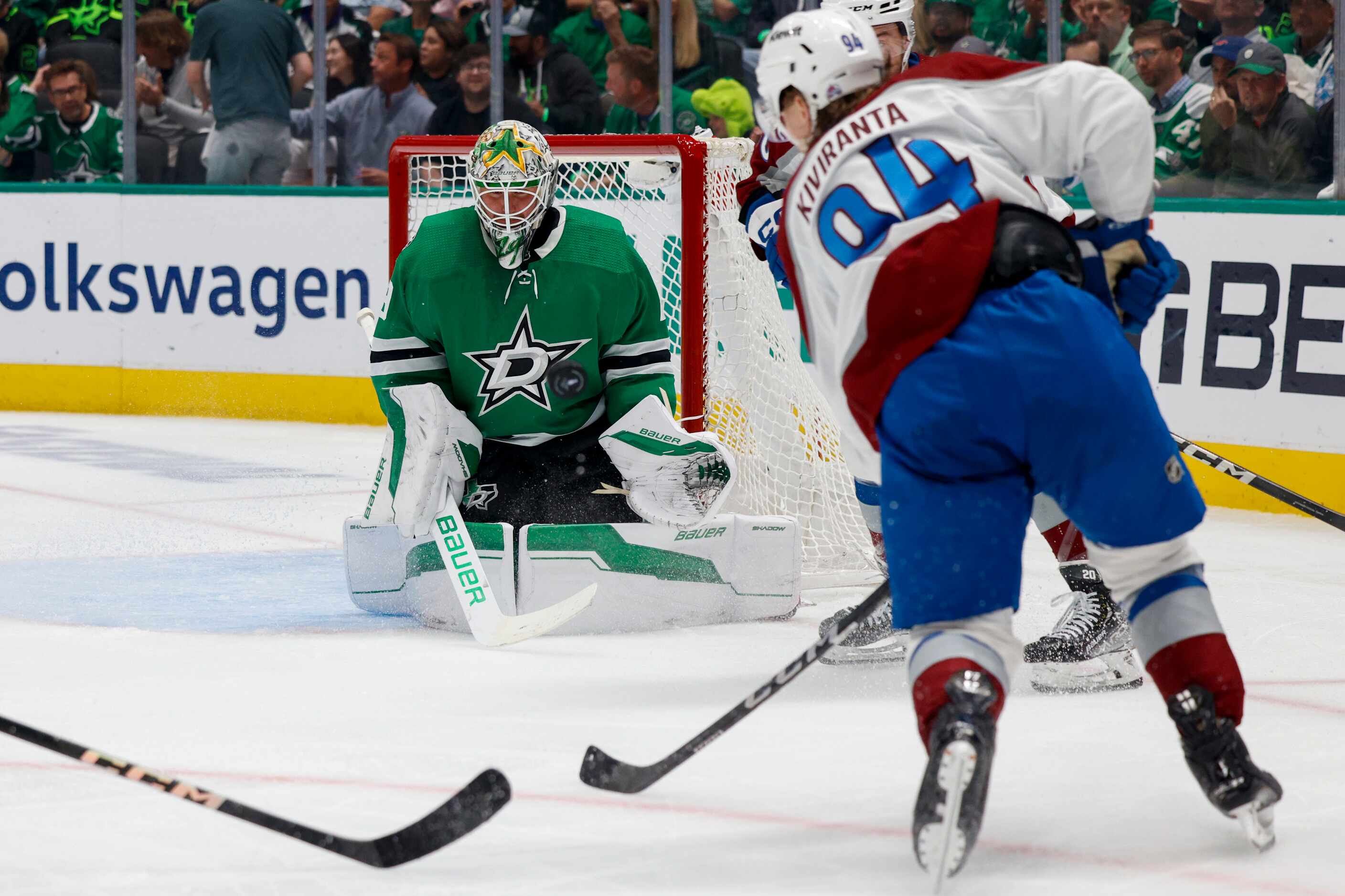 Dallas Stars goaltender Jake Oettinger (29) stops a shot attempt from Colorado Avalanche...