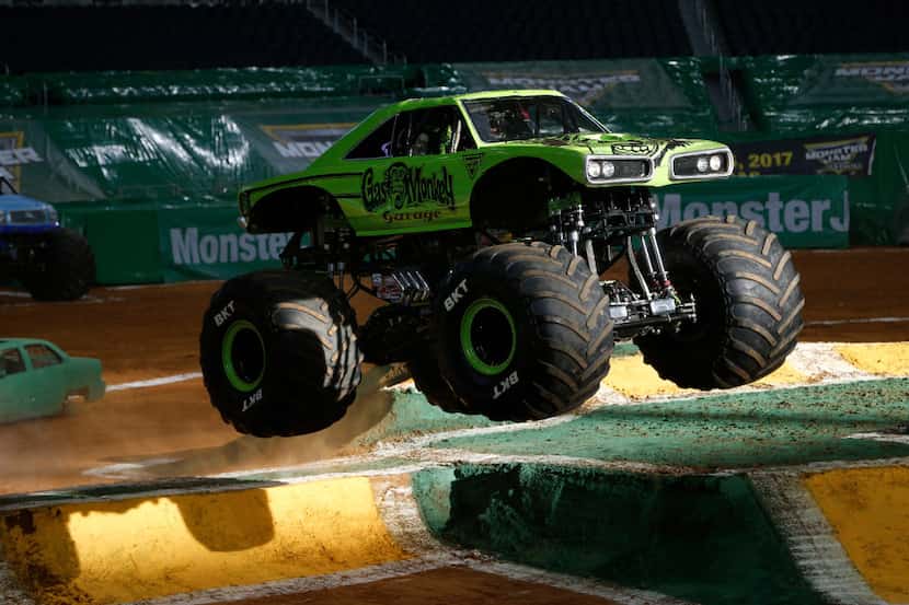 Gas Monkey Garage monster truck driven by B.J. Johnson jumps a ramp during a practice for...