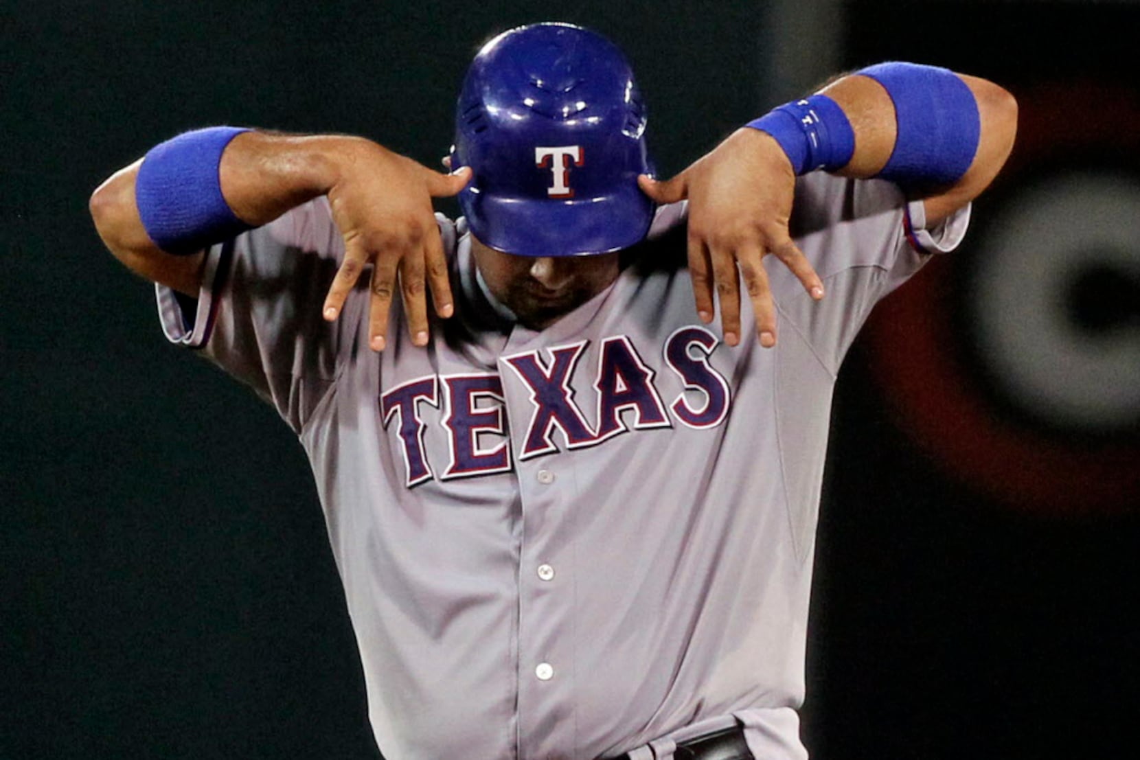 The Texas Rangers' Ian Kinsler leaps to catch the throw as Kansas News  Photo - Getty Images