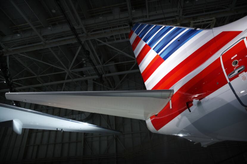A stylized flag of red, white and blue will decorate the tails of planes painted in the new...
