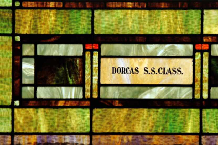A dedication to a Sunday School class of years past is etched into original  stained glass...