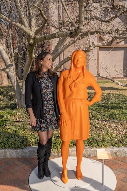 Polymer chemist Roselin Rosario-Melendez stands next to her statue that was created for...