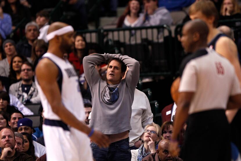 Mavericks owner Mark Cuban reacts to a call in the second half of NBA Basketball action...