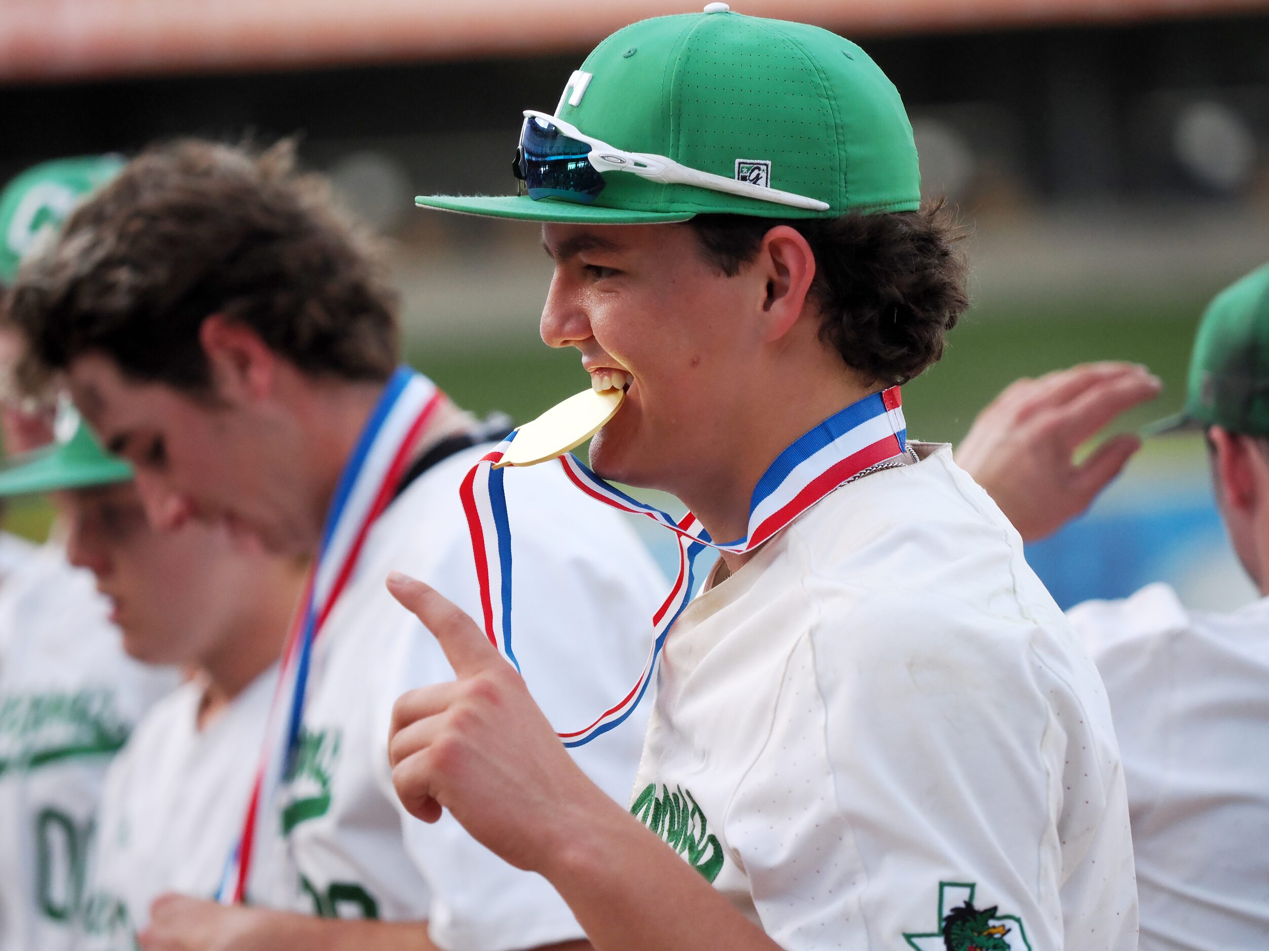 Southlake Carroll starting pitcher Owen Proksch (9) reacts after receiving the first place...