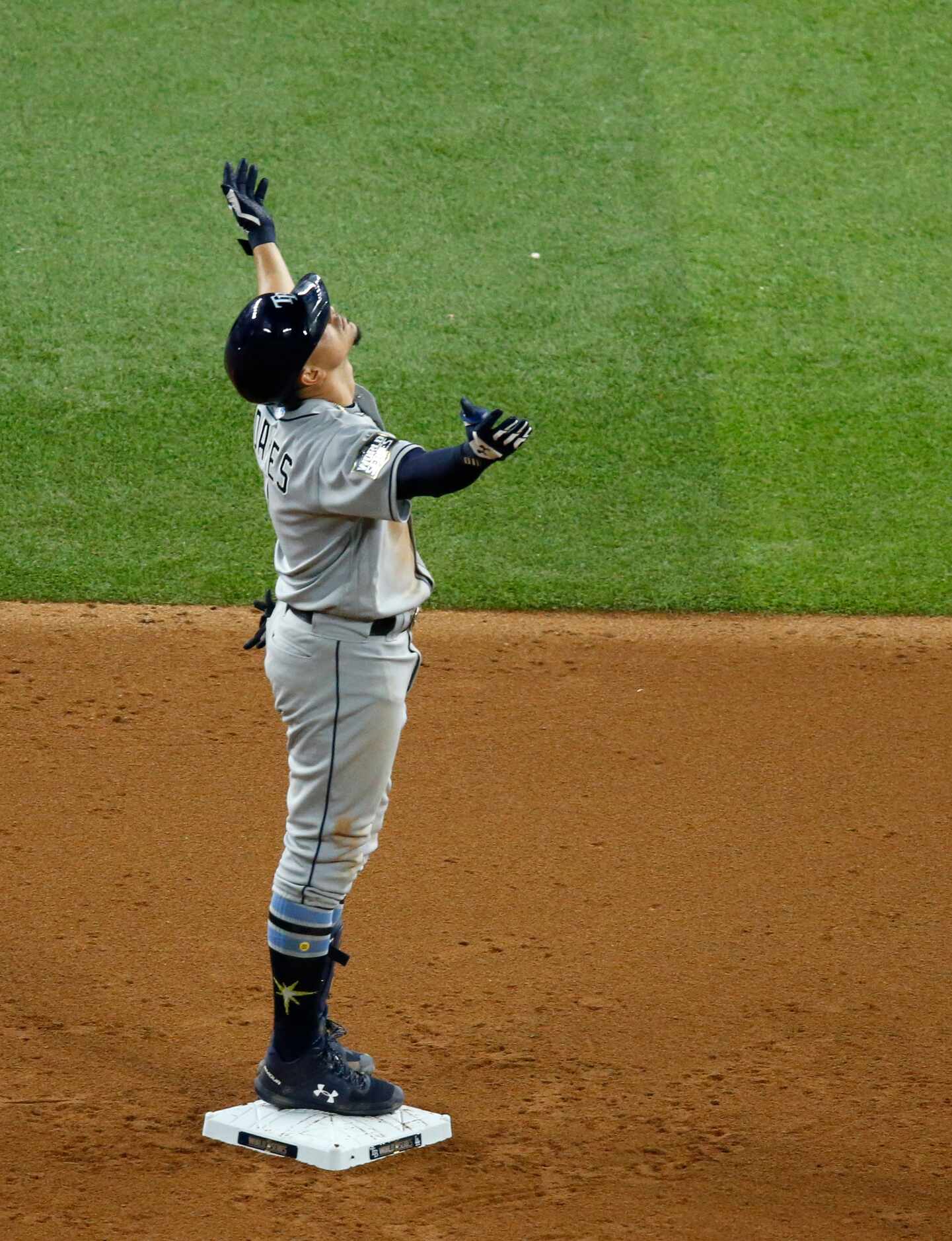 Tampa Bay Rays shortstop Willy Adames (1) reacts after hitting a double off a pitch from Los...
