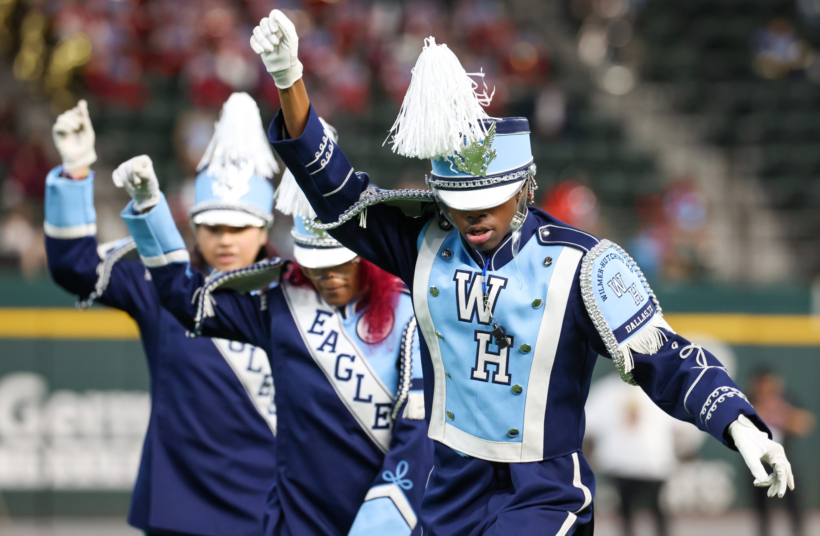 Members of Wilmer-Hutchins High School marching band perform at the Roland Parrish Battle of...