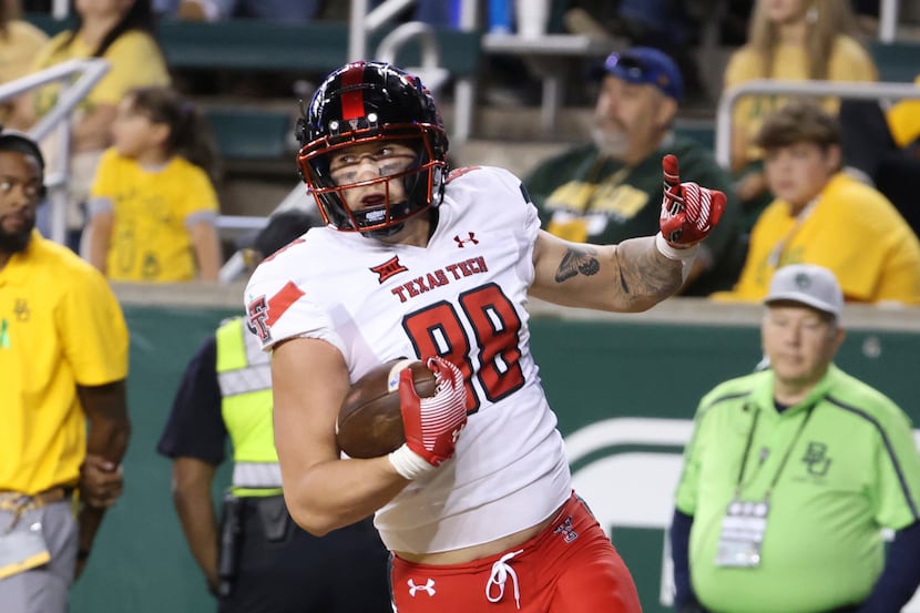 Texas Tech tight end Baylor Cupp celebrates in the end zone after scoring on a pass play...