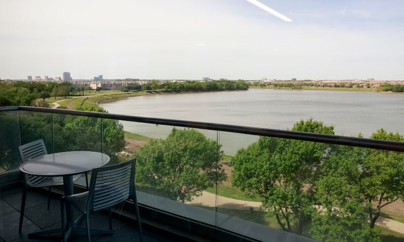 Workers at the PNC Tech Hub office can eat outside at tables that overlook the Elm Fork of...