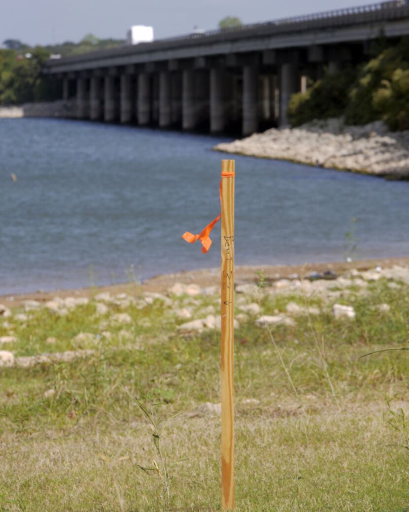 A marker beside Lewisville Lake hints at the I-35E expansion to come, which will include...