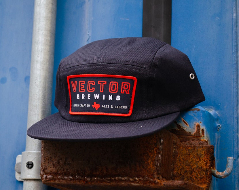 The navy camper patch hat from Vector Brewing in East Dallas