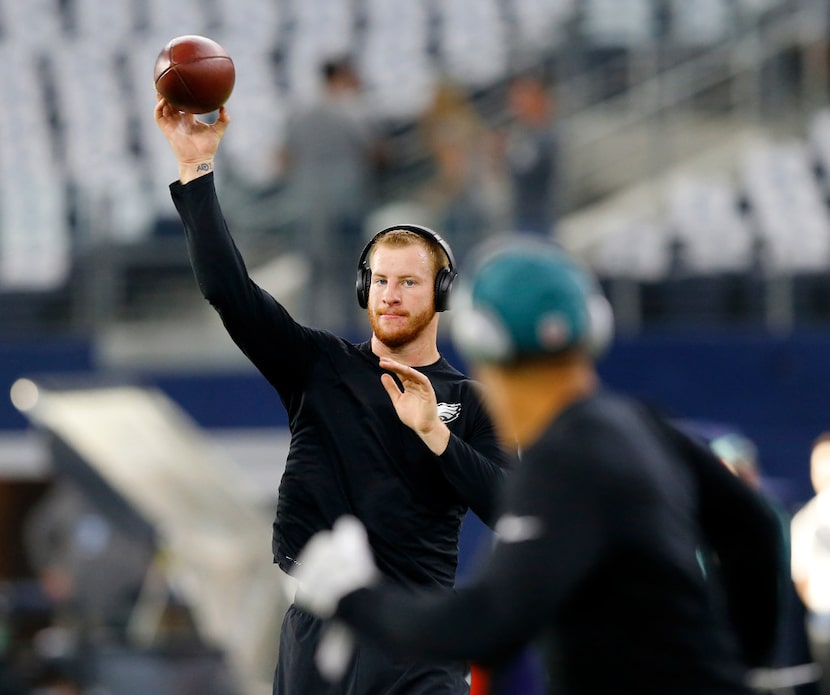 Philadelphia Eagles quarterback Carson Wentz throws passes during pregame warmups before the...