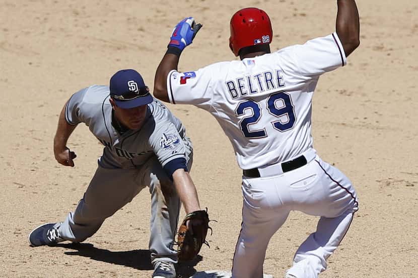 Texas Rangers third baseman Adrian Beltre (29) safely makes it to second base for a double...