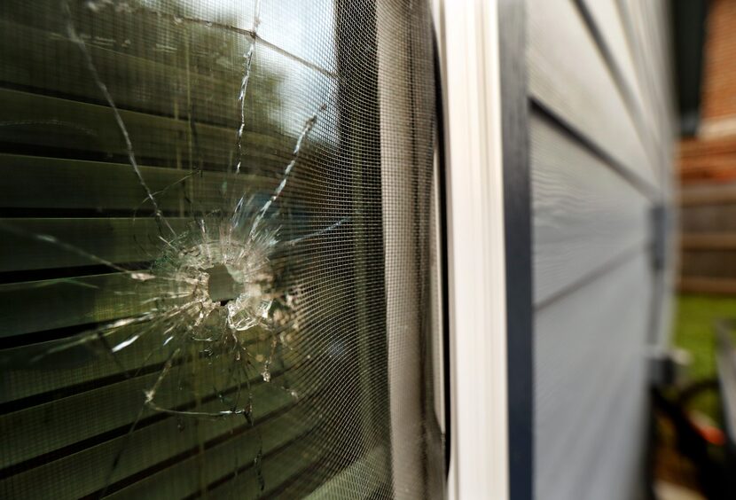 The bullet hole from former Fort Worth police officer Aaron Dean's gunshot is shown in a...