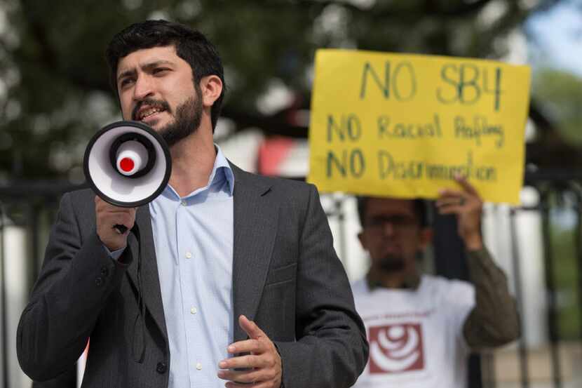 Gregorio Casar District 4 council member speaks as protesters gather outside of the Texas...