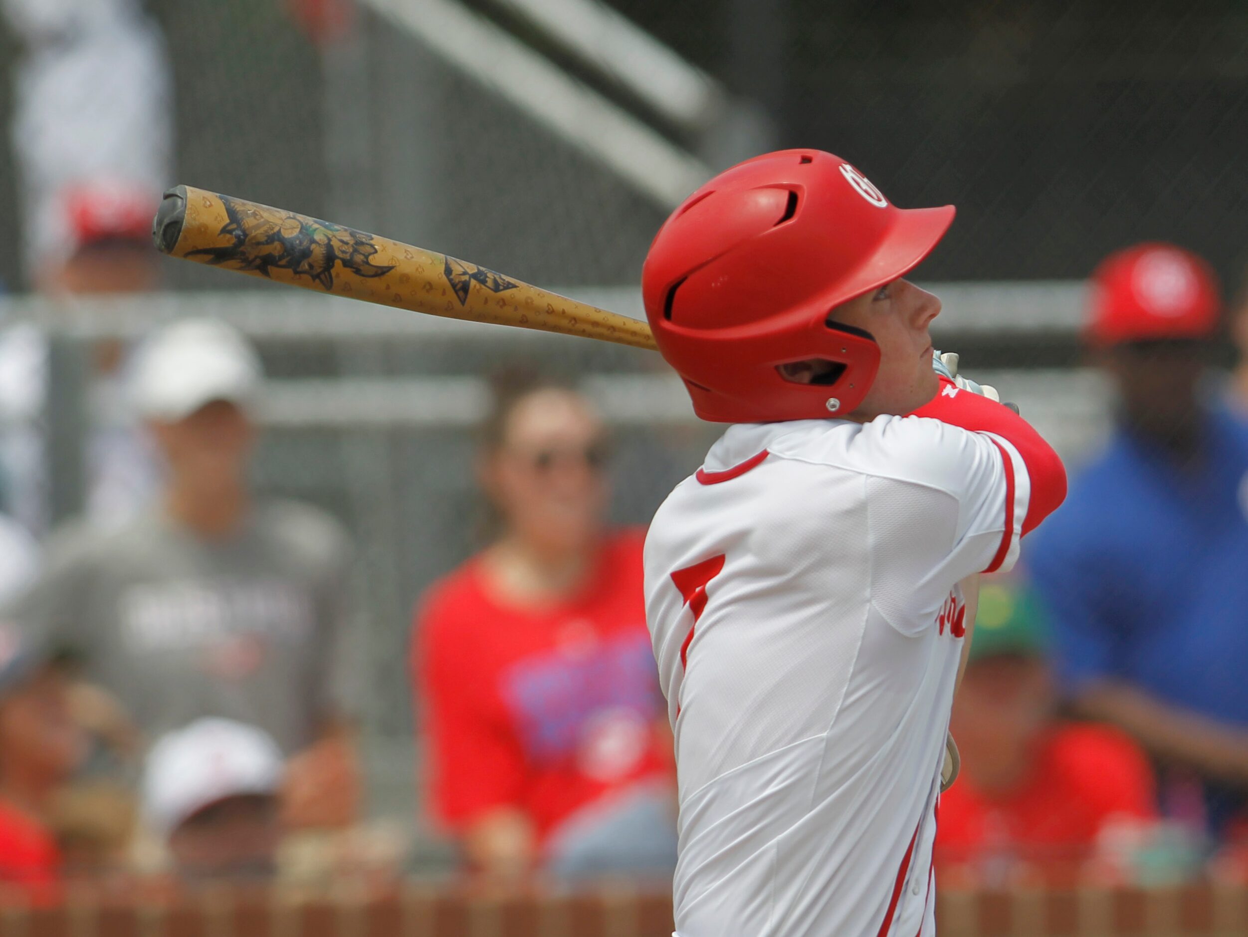 Grapevine's Ryan Williams (7) watches a long drive take a Midlothian Heritage outfielder to...