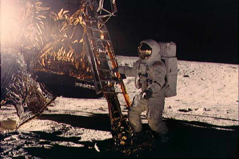 A photo provided by NASA of Alan Bean stepping onto the moon in 1969 during the Apollo 12...