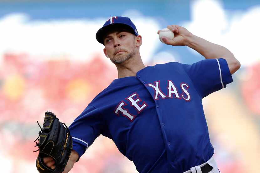 Texas Rangers starting pitcher Mike Minor (23) pitches in the first inning of play in a game...