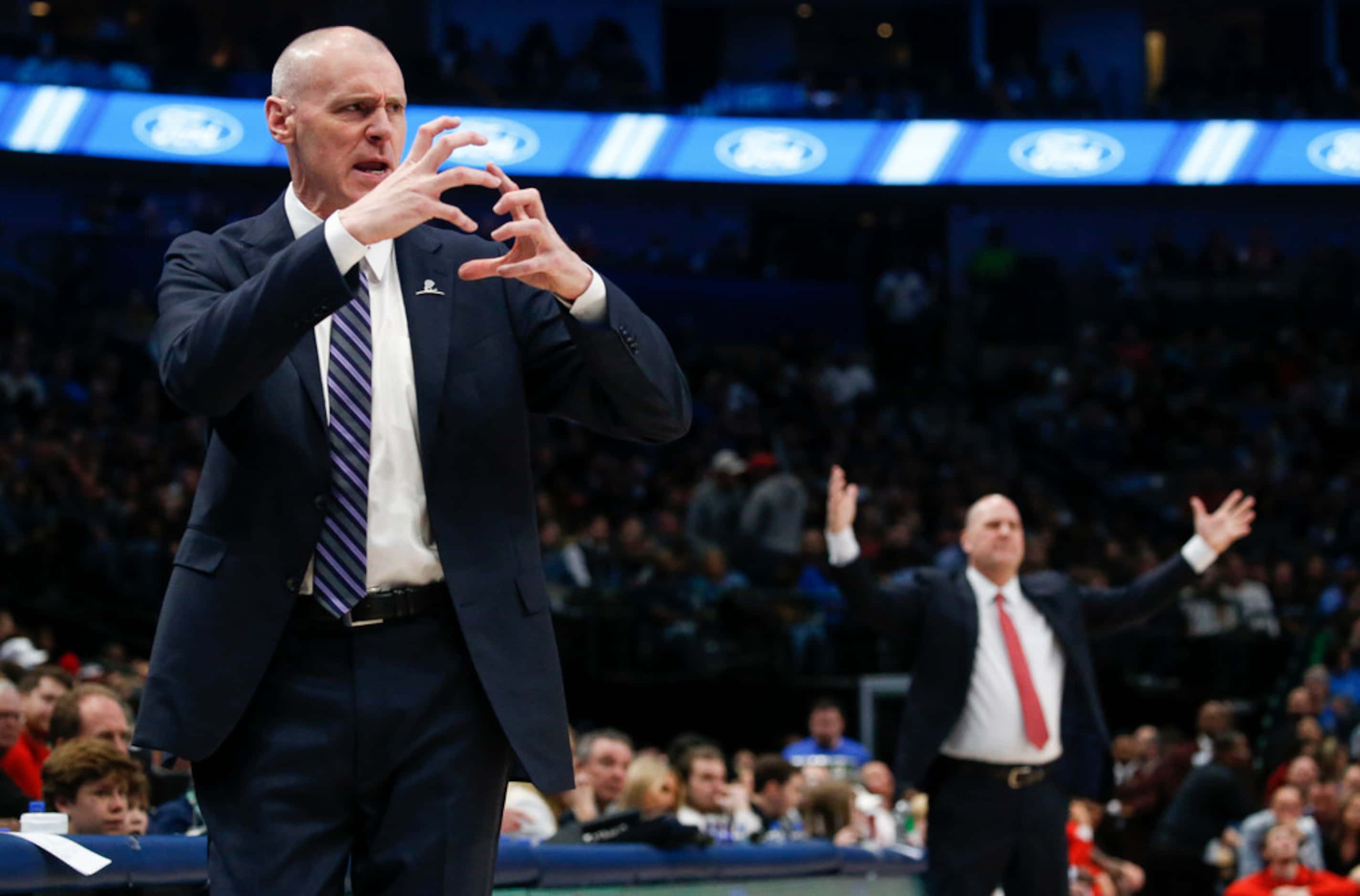 Dallas Mavericks head coach Rick Carlisle calls out a play during the first half of an NBA...