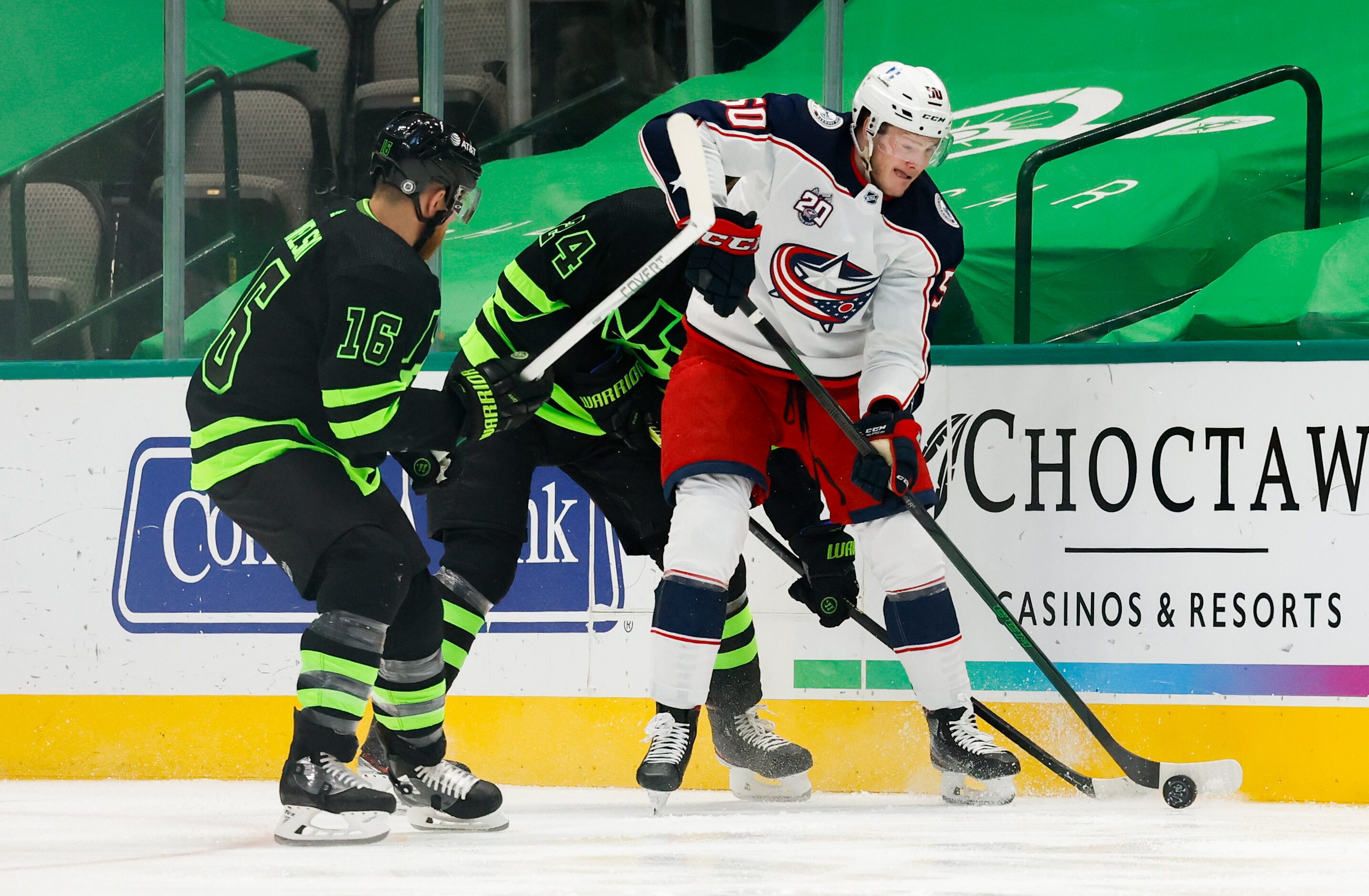 Columbus Blue Jackets left wing Eric Robinson (50) goes for a pass as Dallas Stars center...