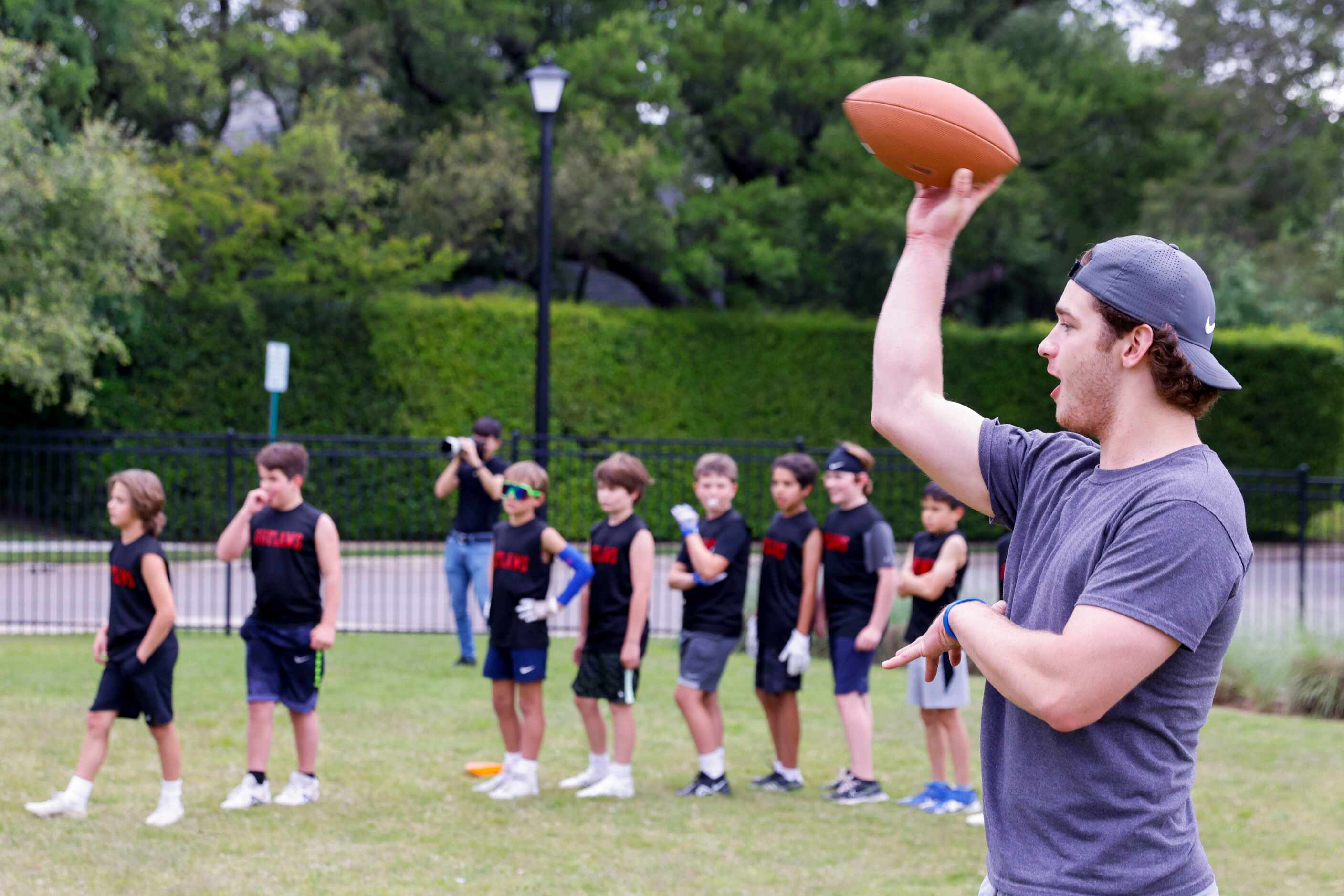 SMU QB Preston Stone throws a ball during a special session of football drills and practice...