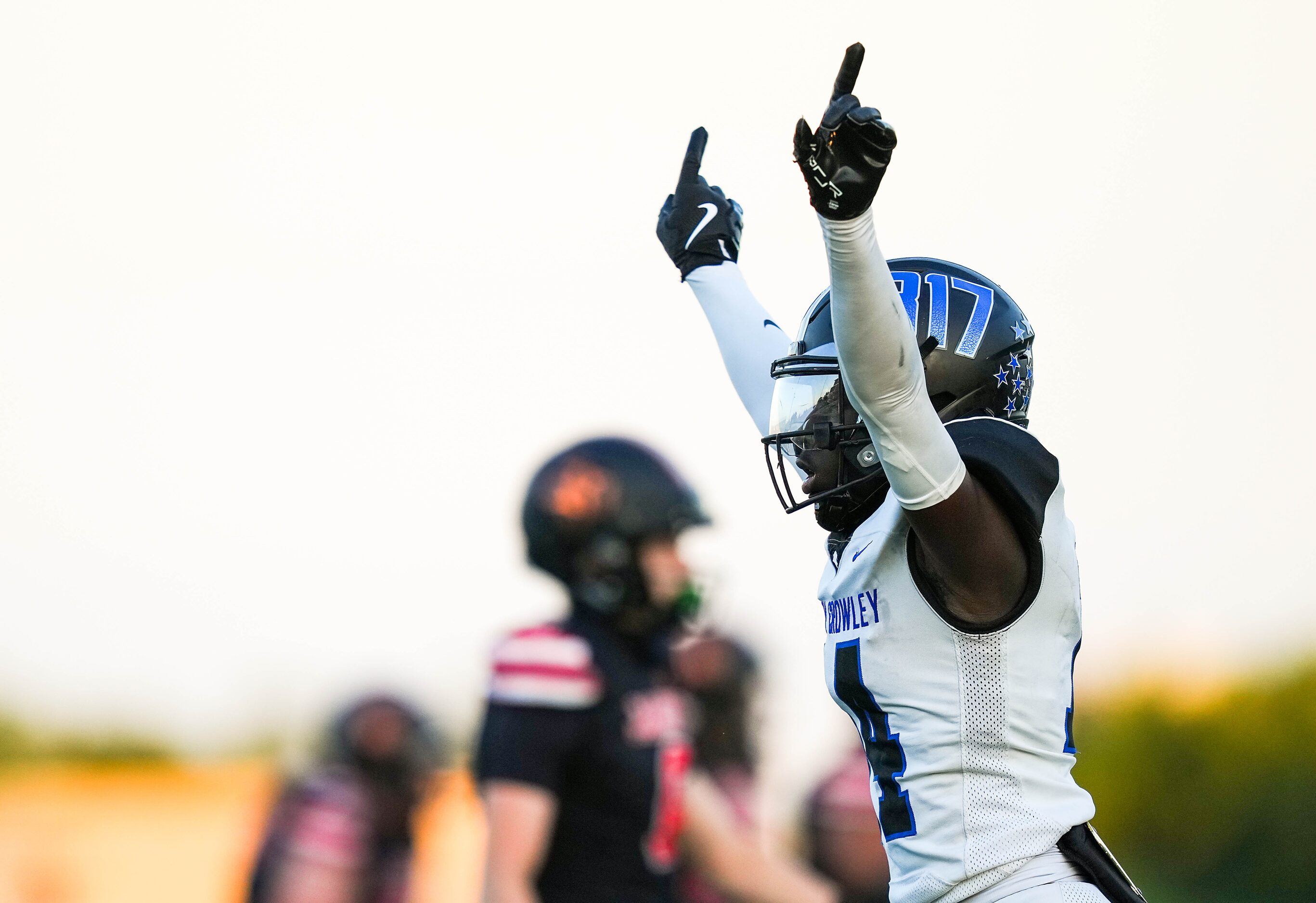 North Crowley’s Thomas Cook Jr. (14) celebrates after a defensive stop during the first half...