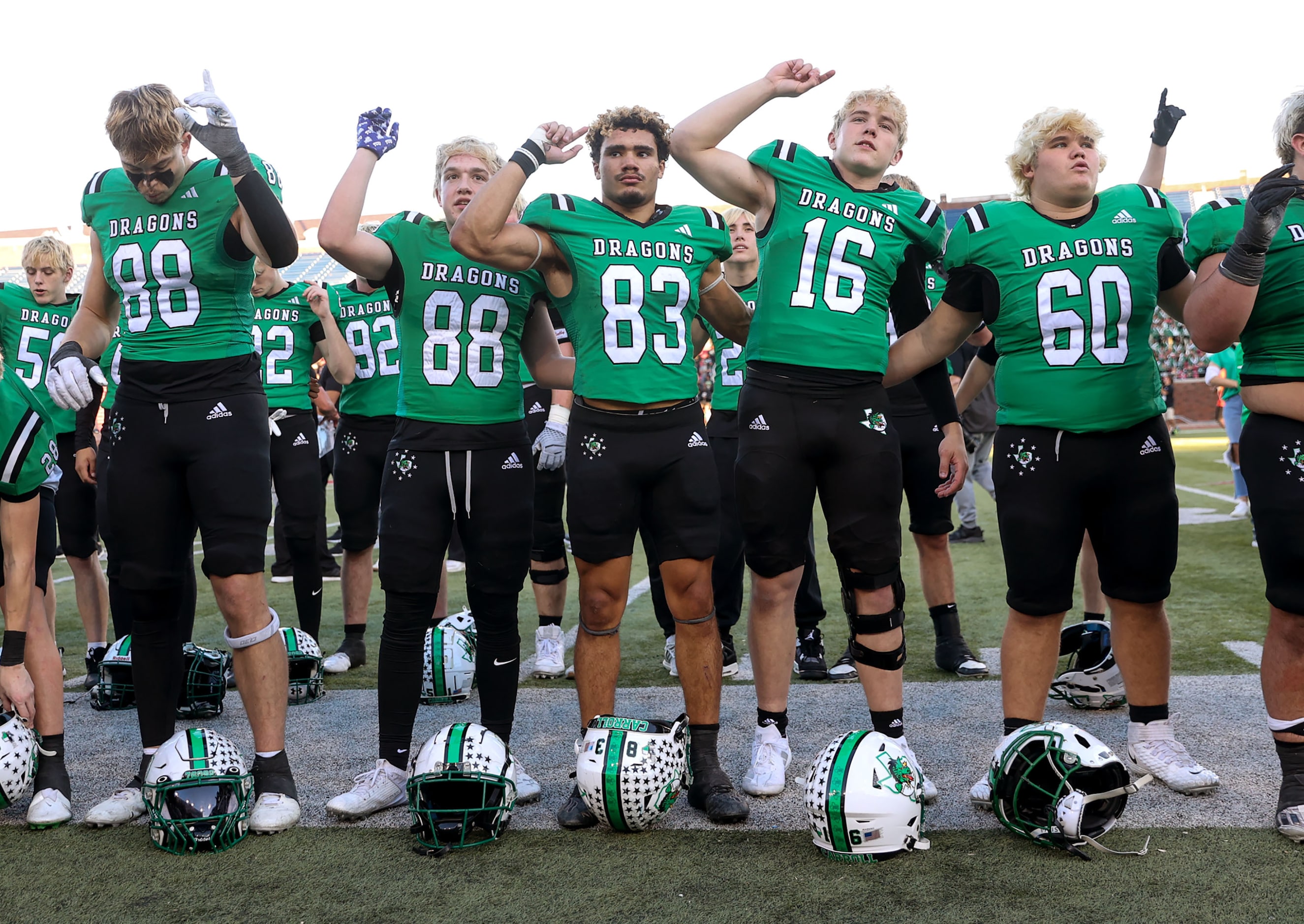 The Southlake Carroll Dragons celebrate a victory over Longview, 20-17 in a Class 6A...