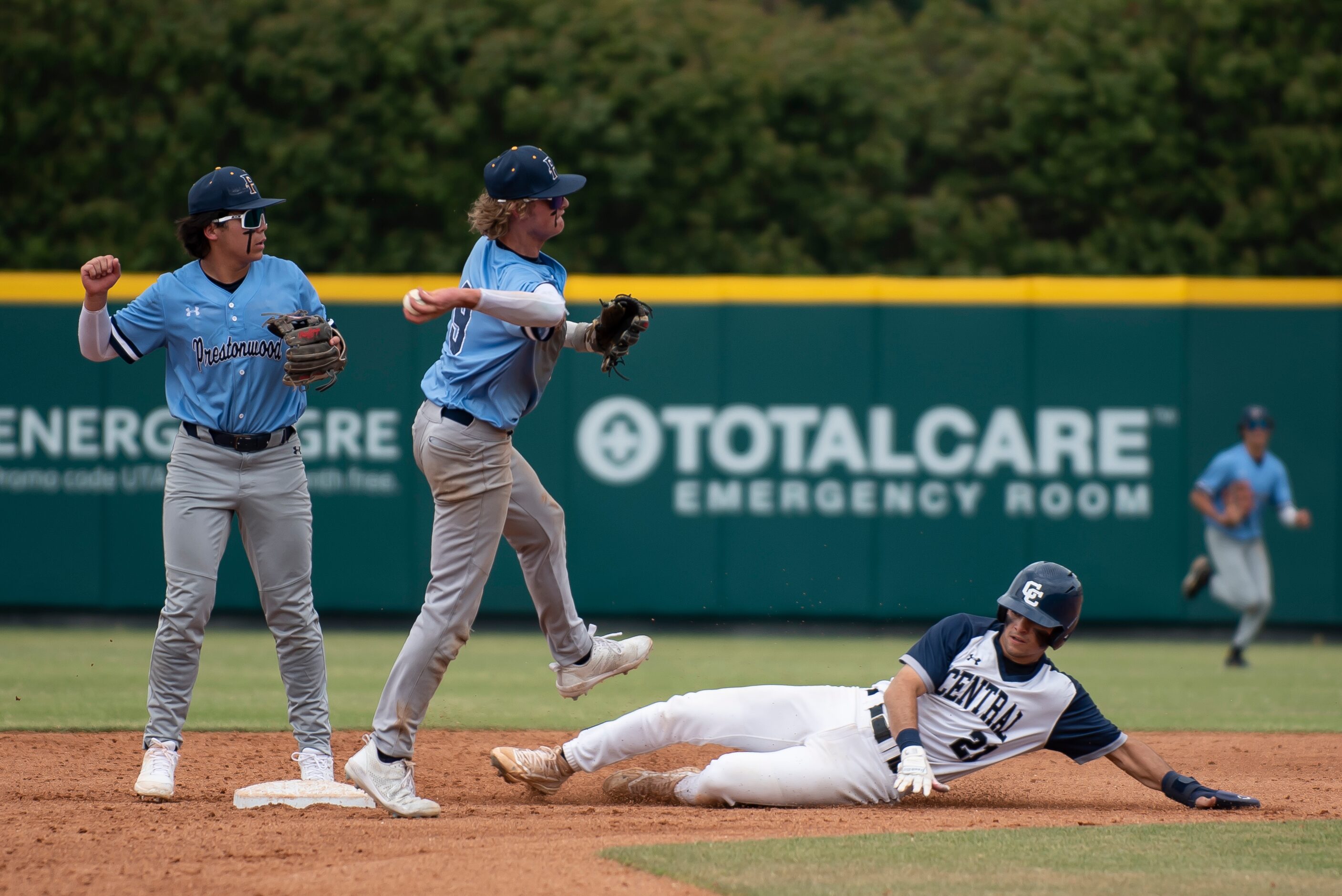 Prestonwood junior Will Johnson (9) steps on second base to get Central Catholic senior...