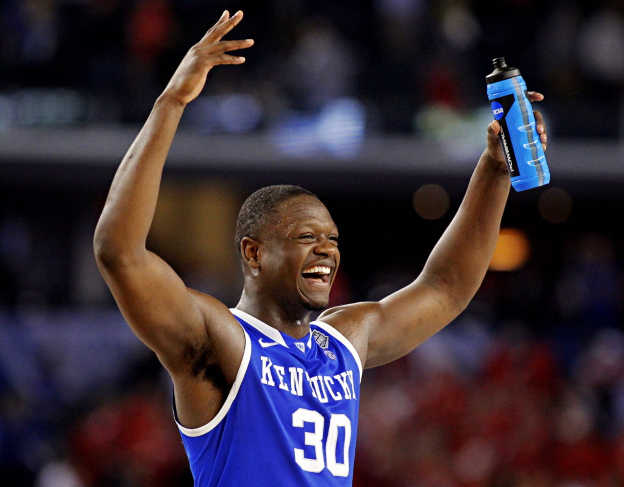 Kentucky Wildcats forward Julius Randle celebrates after a 74-73 win over the Wisconsin...