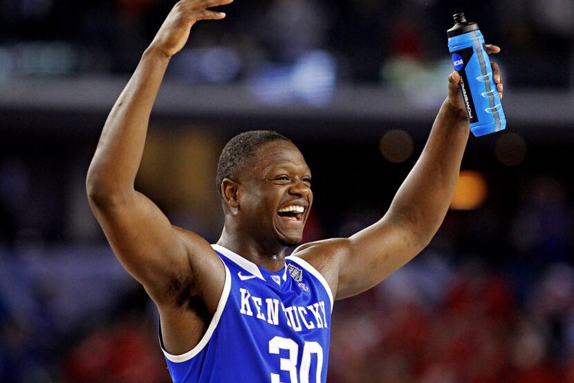 Kentucky Wildcats forward Julius Randle celebrates after a 74-73 win over the Wisconsin...