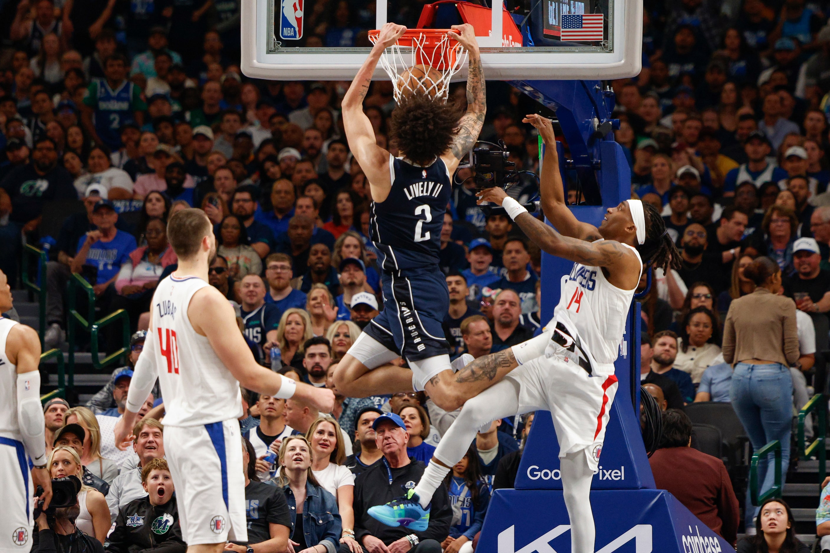 Dallas Mavericks center Dereck Lively II (2) dunks the ball against LA Clippers guard...