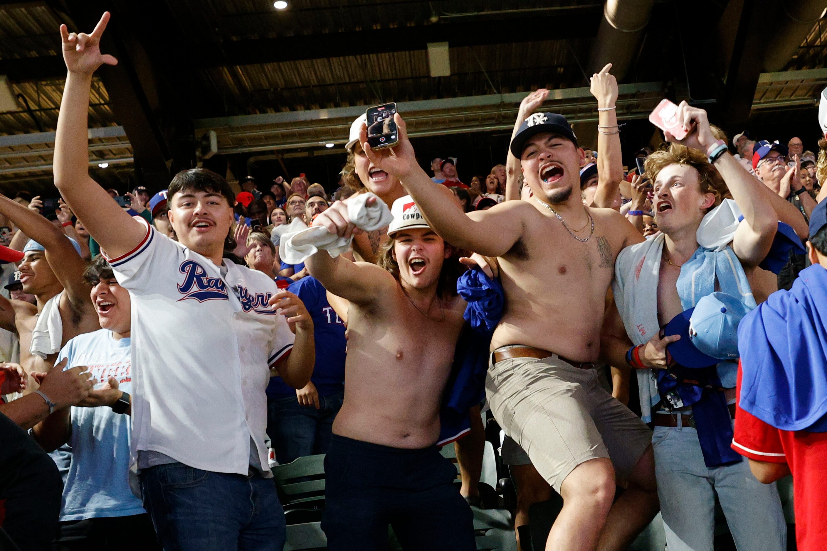 Texas Rangers fans celebrate Rangers victory against Houston Astros during a Game 7 watch...