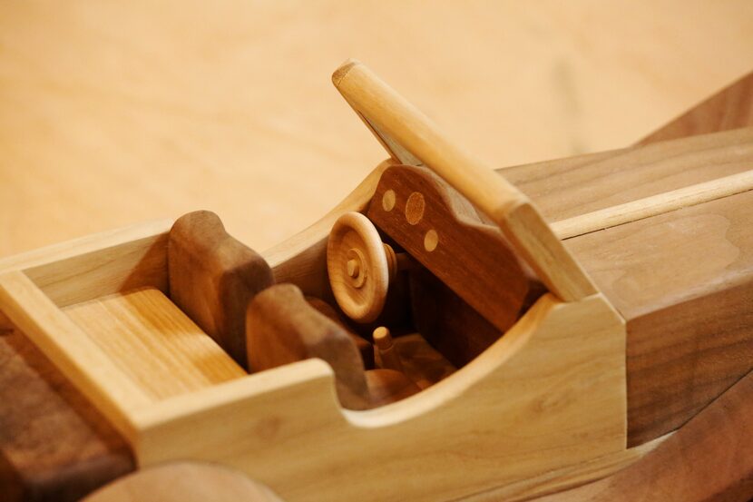 Detail of a wooden toy car made by woodworker John Ellzey photographed in his Garland shop...