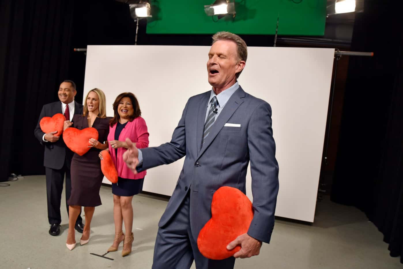 Local TV evening news anchors John McCaa (left), Meredith Land and Clarice Tinsley have a...