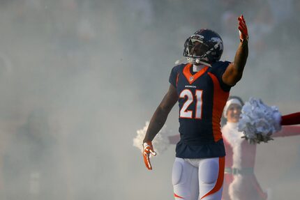 DENVER, CO - DECEMBER 18:  Cornerback Aqib Talib #21 of the Denver Broncos runs onto the...