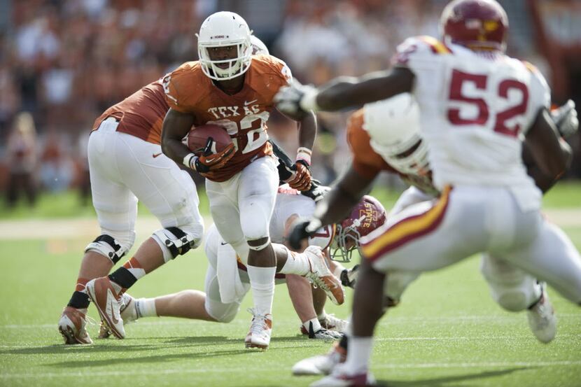 Johnathan Gray #32 of the Texas Longhorns breaks free during the Big 12 Conference game...