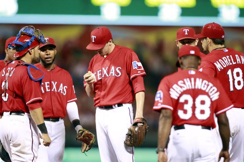 Sep 24, 2013; Arlington, TX, USA; Texas Rangers relief pitcher Tanner Scheppers (52) is...
