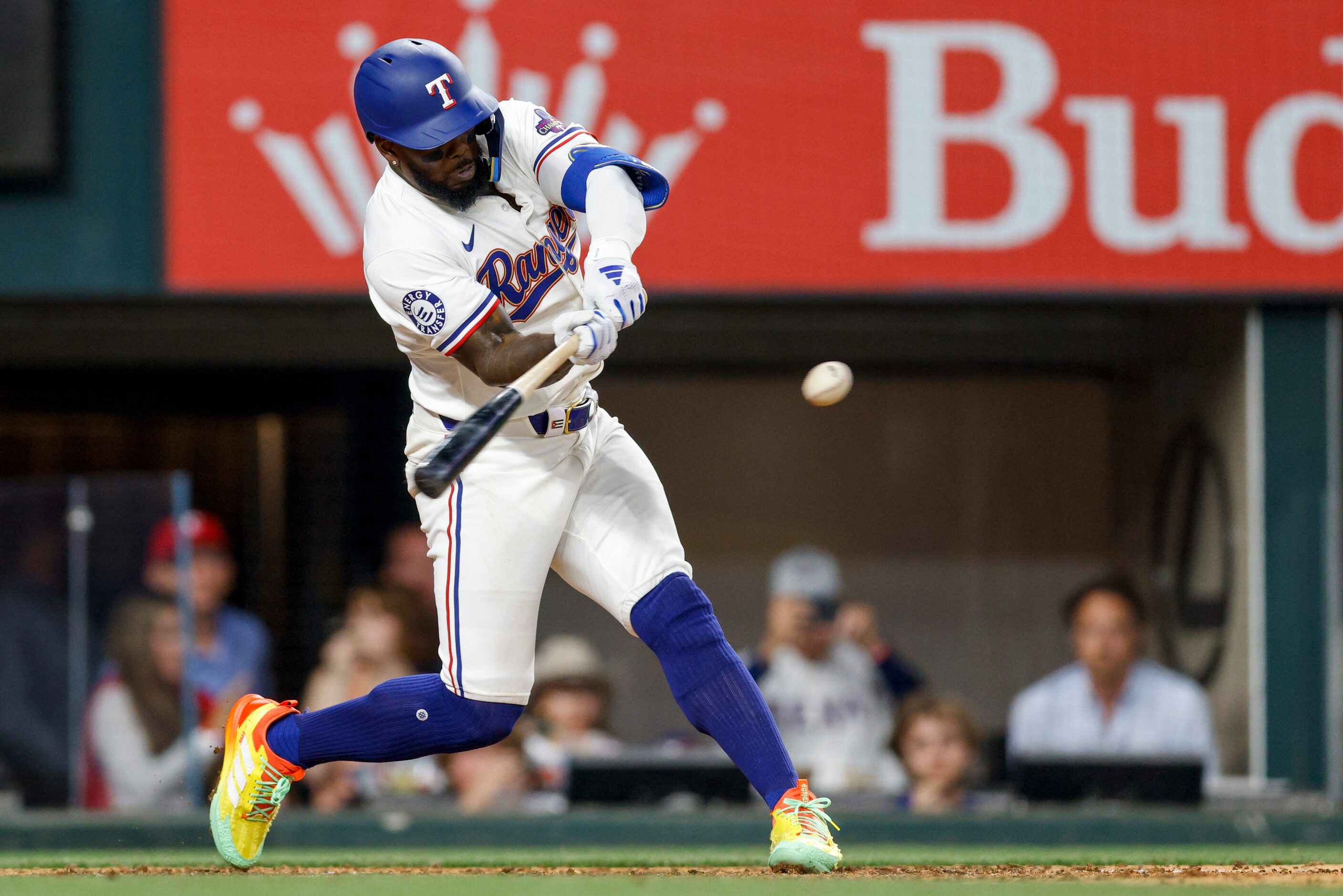 Texas Rangers right fielder Adolis Garcia (53) hits a solo home run during the sixth inning...