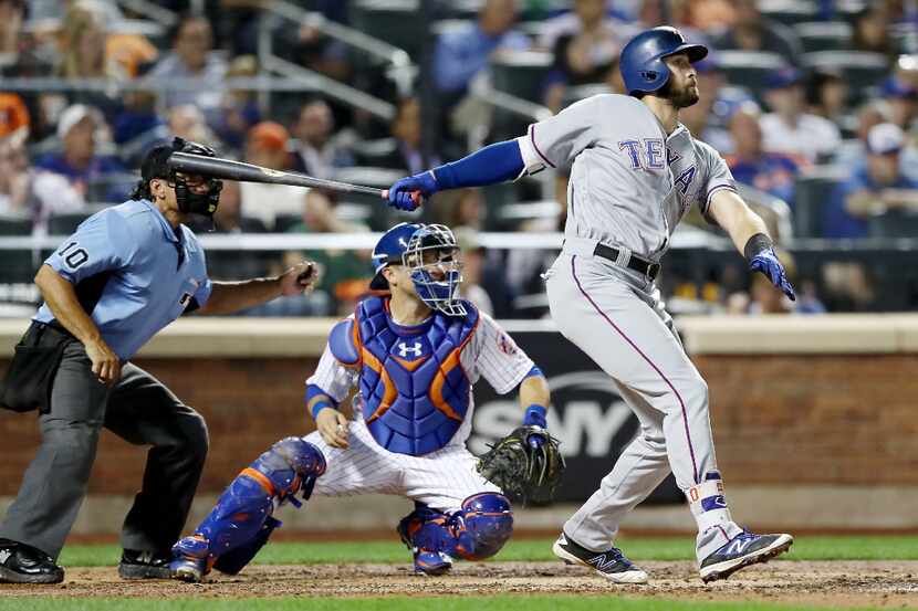 NEW YORK, NY - AUGUST 08:  Joey Gallo #13 of the Texas Rangers hits an RBI double as Travis...