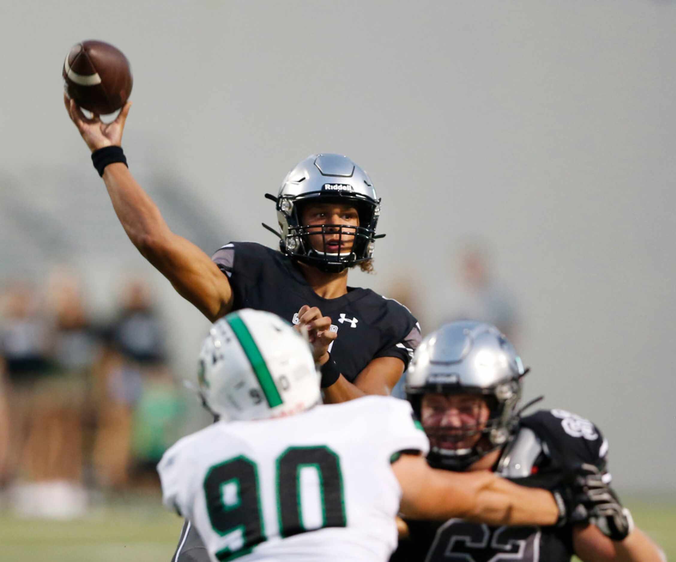 Denton Guyer's Eli Stowers (5) attempts a pass in a game against Southlake Carroll during...