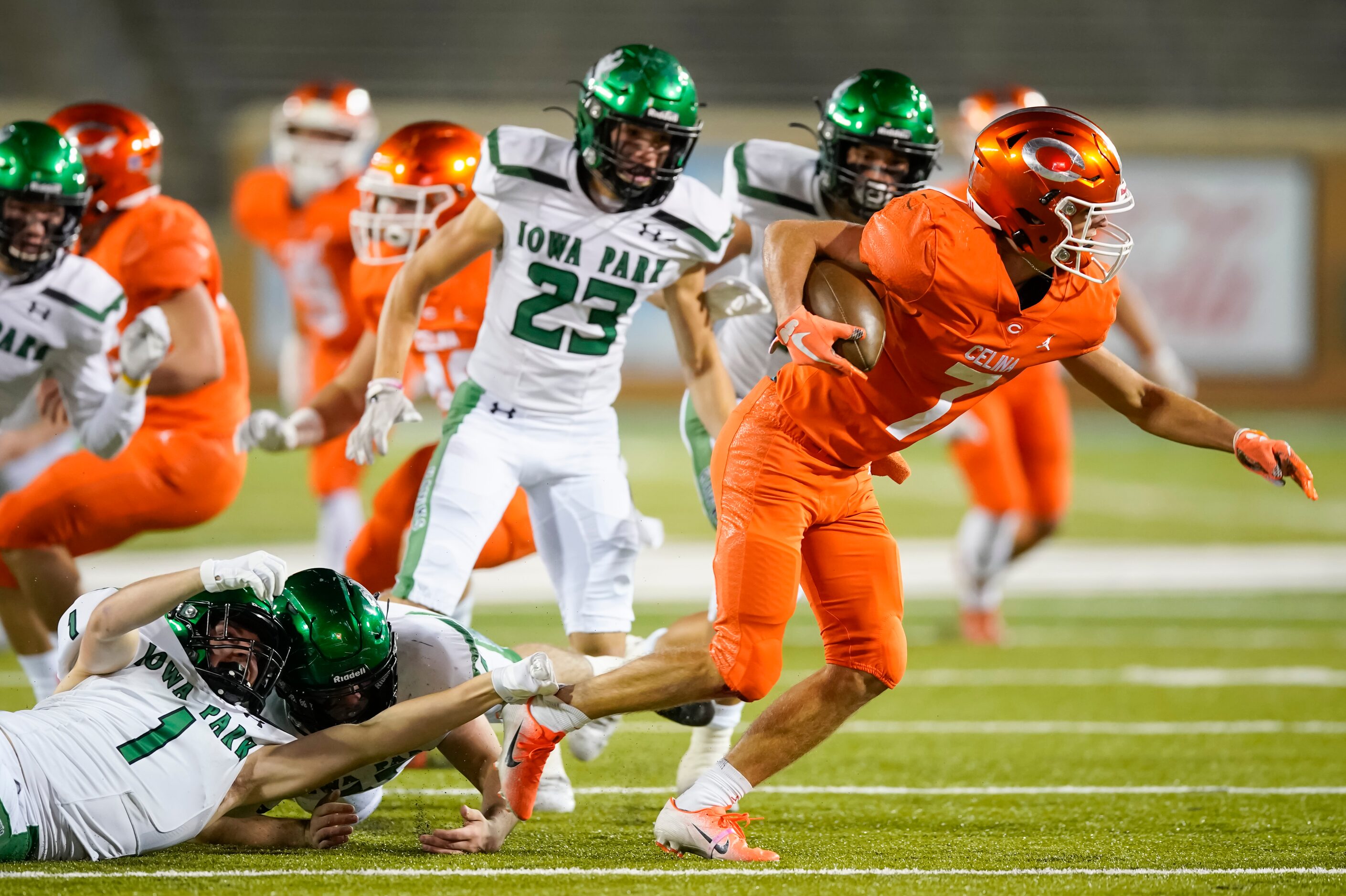 Celina wide receiver Caden Knowles (7) slips away from Iowa Park defensive back Nicholas...