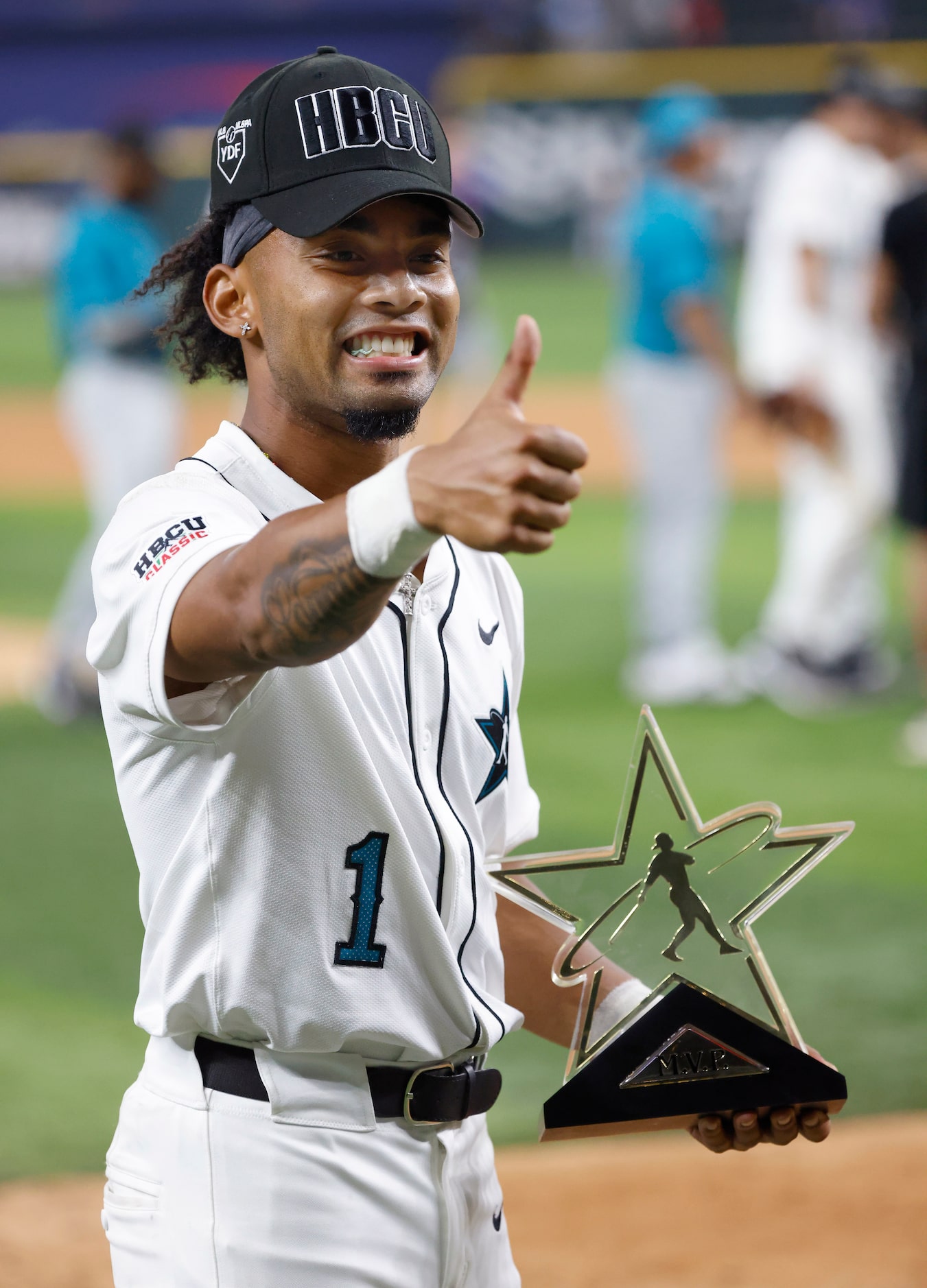  American League player Tiger Borom of Grambling State gives a thumbs up after earning Most...