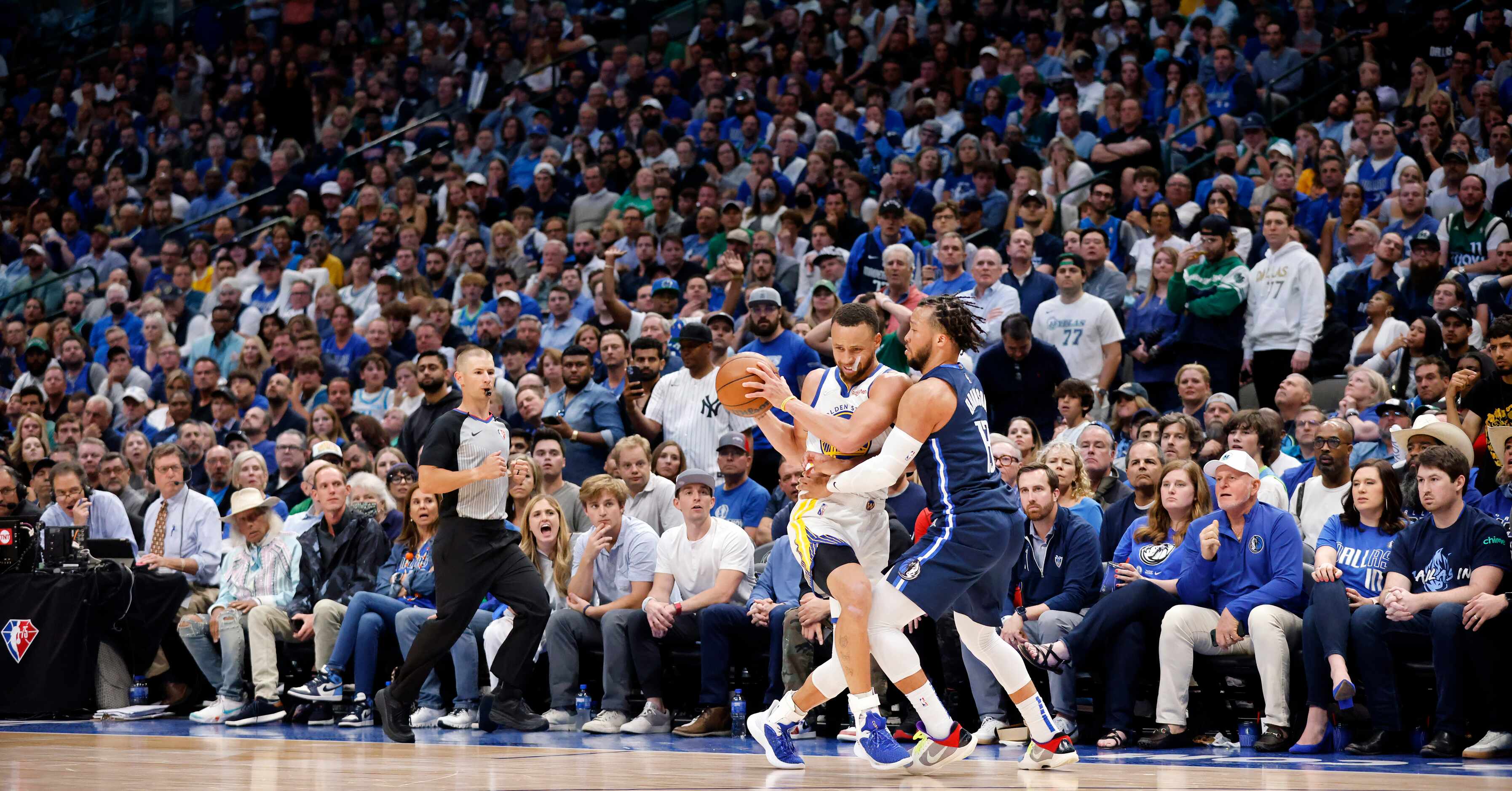 Dallas Mavericks guard Jalen Brunson (13) stops Golden State Warriors guard Stephen Curry...