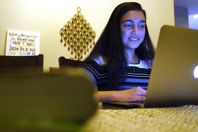 Charvi Goyal, 17, gives an online math tutoring session from her family's home Monday, Jan....