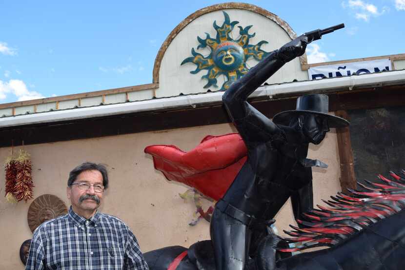 Glencoe Fruit Stand owner Monroy Montes installed a life-sized statue of Texas Tech's Masked...